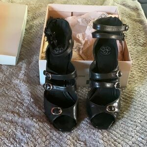 Black leather Stillettos